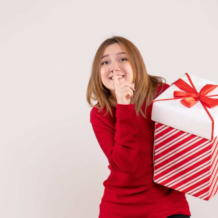 front-view-young-female-standing-with-present-her-hands